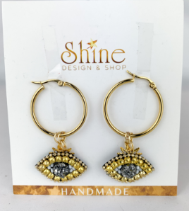 yellow eye earrings