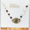 yellow eye necklace